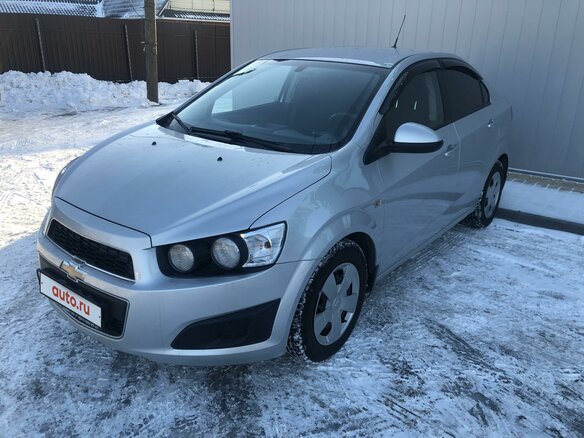 2015 Chevrolet Aveo II, серебристый - вид 1