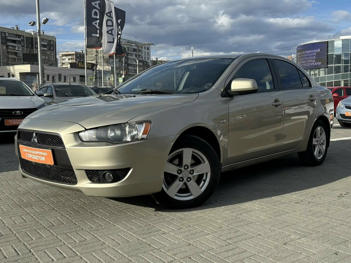Открыть фотографии: Mitsubishi Lancer X
