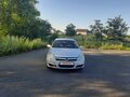2009 Opel Astra GTC H Рестайлинг, серебристый, 599000 рублей - вид 1