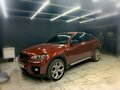 2008 BMW X6 35i 6-speed I (E71), красный, 1650000 рублей