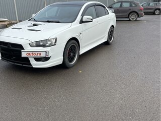 2011 Mitsubishi Lancer X Рестайлинг, белый, 900000 рублей, вид 1
