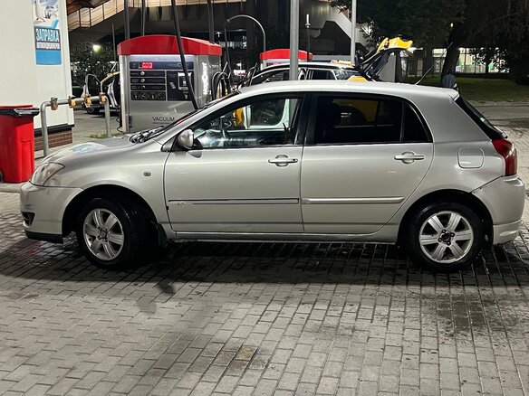 2005 Toyota Corolla IX (E120, E130) Рестайлинг, серебристый - вид 2
