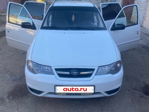 2009 Daewoo Nexia I Рестайлинг, белый, 215000 рублей