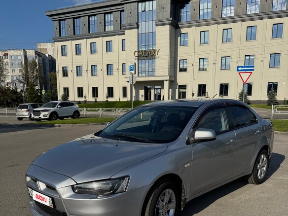 2010 Mitsubishi Lancer X, серебристый, 780000 рублей - вид 1