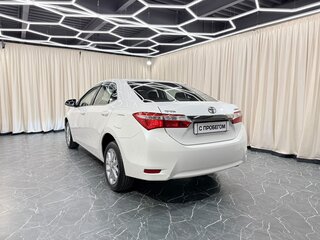 2014 Toyota Corolla XI (E160, E170, E180), белый, 1749000 рублей, вид 4