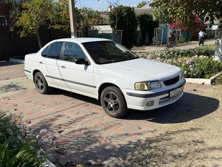 1999 Nissan Sunny B15, белый, 370000 рублей, вид 1