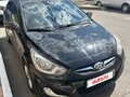 2011 Hyundai Solaris I, чёрный, 810000 рублей - вид 2