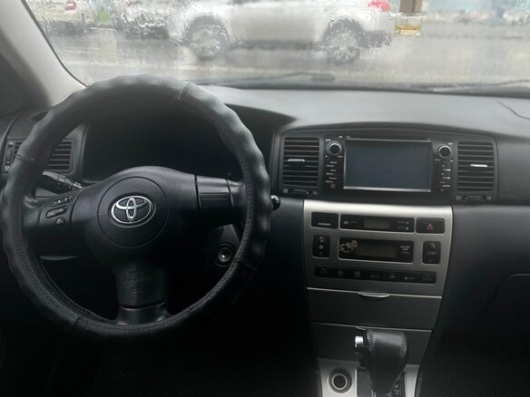 2007 Toyota Corolla IX (E120, E130) Рестайлинг, чёрный, 870000 рублей - вид 4