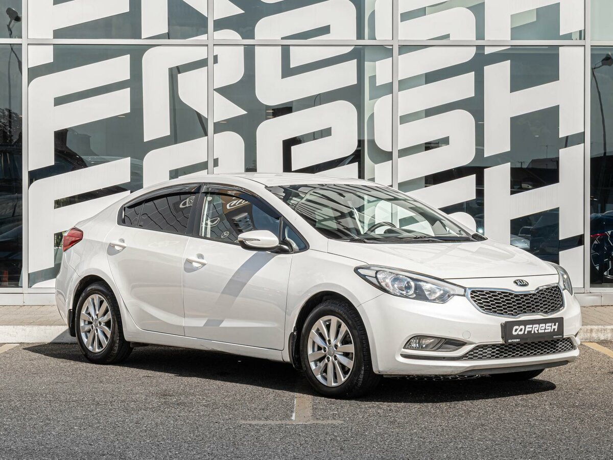 Открыть фотографии: Kia Cerato III