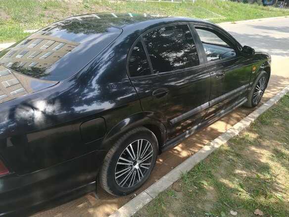 2004 Chevrolet Evanda, чёрный, 450000 рублей - вид 1