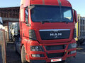 2012 MAN TGX, красный, 2840000 рублей - вид 1