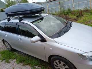 2010 Toyota Corolla Axio X (E140, E150) Рестайлинг, серебристый, 700000 рублей, вид 2