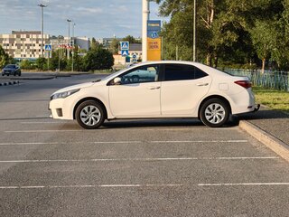 2014 Toyota Corolla XI (E160, E170, E180), белый, 1049000 рублей, вид 2