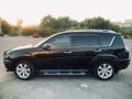 2009 Mitsubishi Outlander II Рестайлинг, чёрный, 1550000 рублей - вид 8