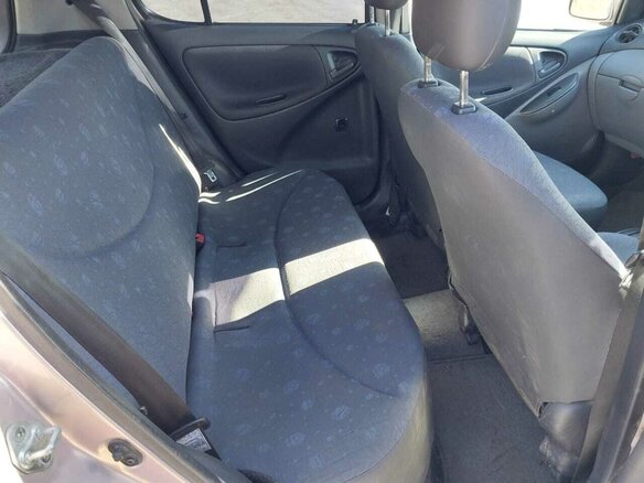 2001 Toyota Vitz I (P10), розовый, 399000 рублей - вид 17