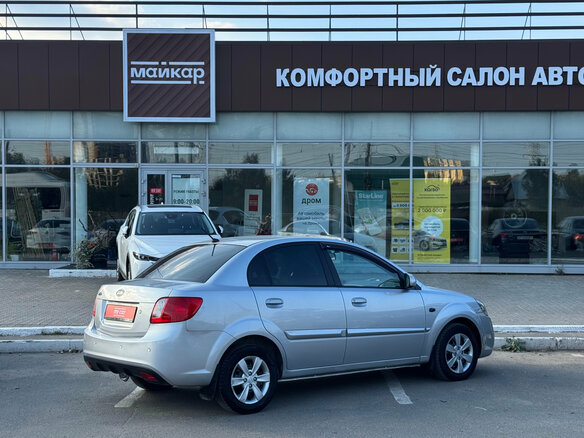 2011 Kia Rio II Рестайлинг, серебристый - вид 3