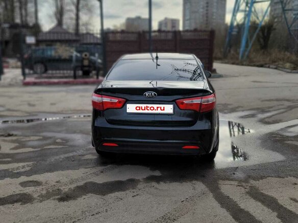 2014 Kia Rio 6-speed III, чёрный, 750000 рублей - вид 5