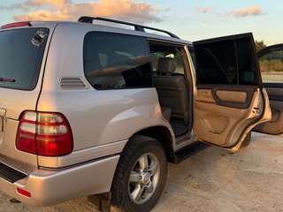 2002 Toyota Land Cruiser 100 Series Рестайлинг 1, серый, 1900000 рублей, вид 4