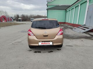 2010 Nissan Tiida I, золотистый, 850000 рублей, вид 4