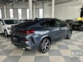2021 BMW X6 40i III (G06), серый, 8819000 рублей - вид 4