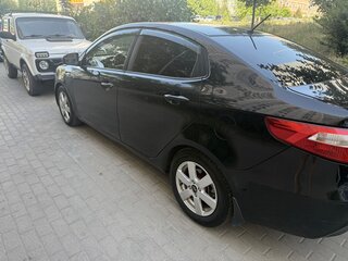 2011 Kia Rio 4-speed III, чёрный, 789990 рублей, вид 5