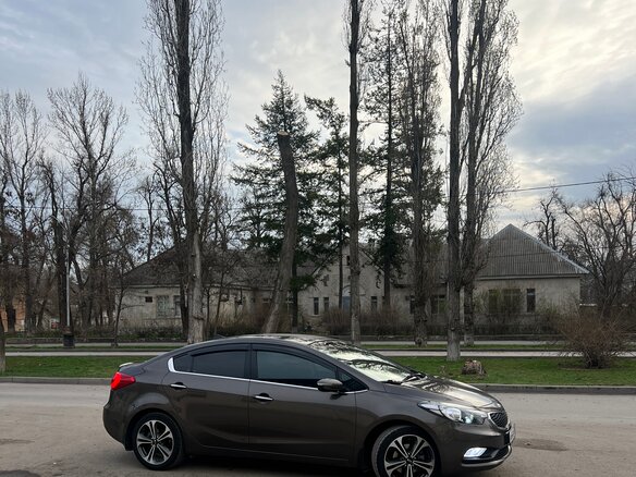2016 Kia Cerato III Рестайлинг (Classic), коричневый, 1450000 рублей - вид 6