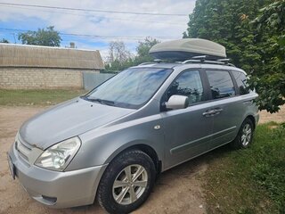 2009 Kia Carnival II, серебристый, 990000 рублей, вид 1