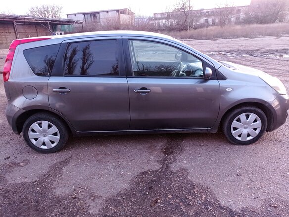 2009 Nissan Note I Рестайлинг, серый, 650000 рублей - вид 2