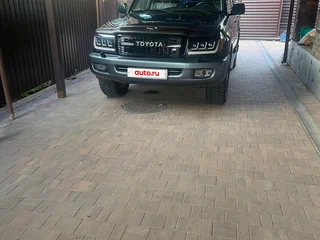2005 Toyota Land Cruiser 100 Series Рестайлинг 2, зелёный, 1766666 рублей, вид 5