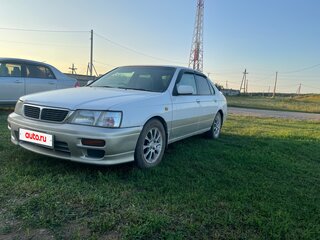 1999 Nissan Bluebird QG18 XI (U14), белый, 290000 рублей, вид 1