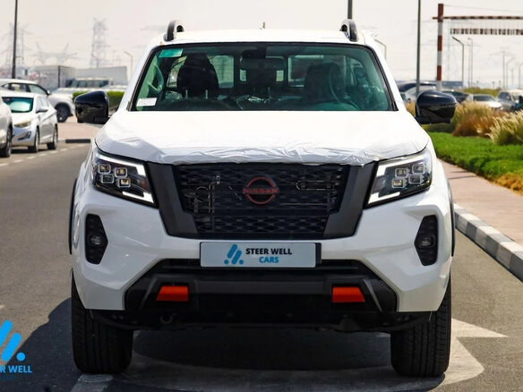 2026 Nissan Navara (Frontier) IV (D23) Рестайлинг, белый - вид 1