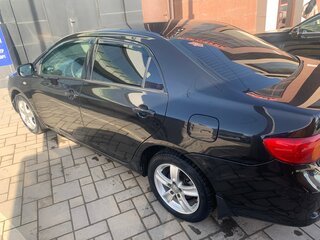 2009 Toyota Corolla X (E140, E150), чёрный, 899000 рублей, вид 2
