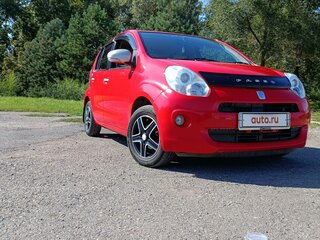 2010 Toyota Passo II (C30), красный, 750000 рублей, вид 1