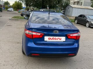 2011 Kia Rio 4-speed III, синий, 700000 рублей, вид 4