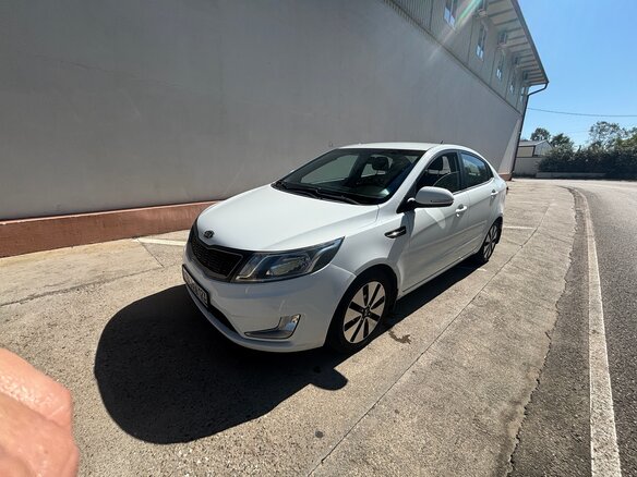 2011 Kia Rio 4-speed III, белый, 1050000 рублей