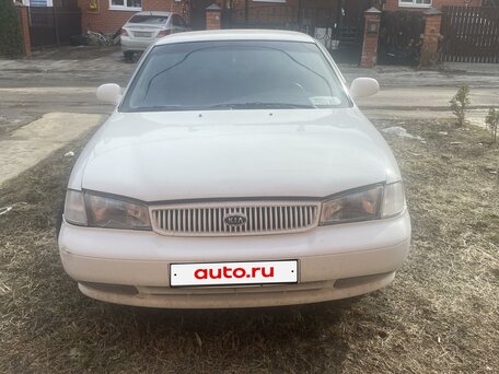 1997 Kia Clarus I, белый, вид 1