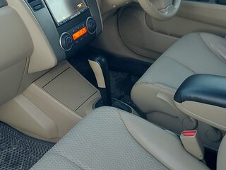 2010 Nissan Tiida I, белый, 740000 рублей, вид 5