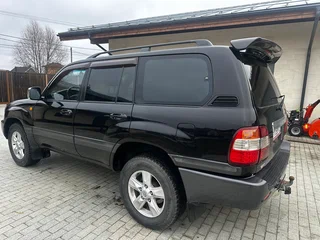 2006 Toyota Land Cruiser 100 Series Рестайлинг 2, чёрный, 1850000 рублей, вид 4