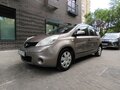2010 Nissan Note I Рестайлинг, коричневый, 650000 рублей - вид 1