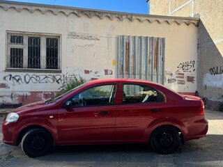 2011 Chevrolet Aveo I Рестайлинг, красный, 530000 рублей, вид 5