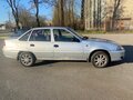 2012 Daewoo Nexia I Рестайлинг, серебристый, 170000 рублей - вид 2