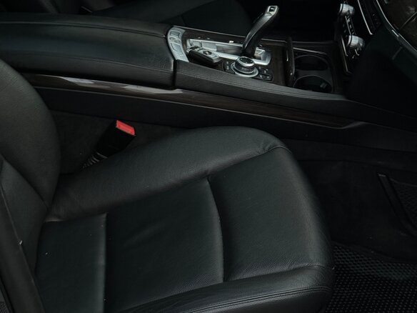 2011 BMW 7 серии 750i xDrive V (F01/F02/F04), чёрный - вид 10