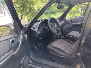 2010 Chevrolet Niva I Рестайлинг, чёрный, 550000 рублей, вид 5