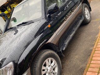 2003 Toyota Land Cruiser 100 Series Рестайлинг 1, чёрный, 2400000 рублей, вид 5