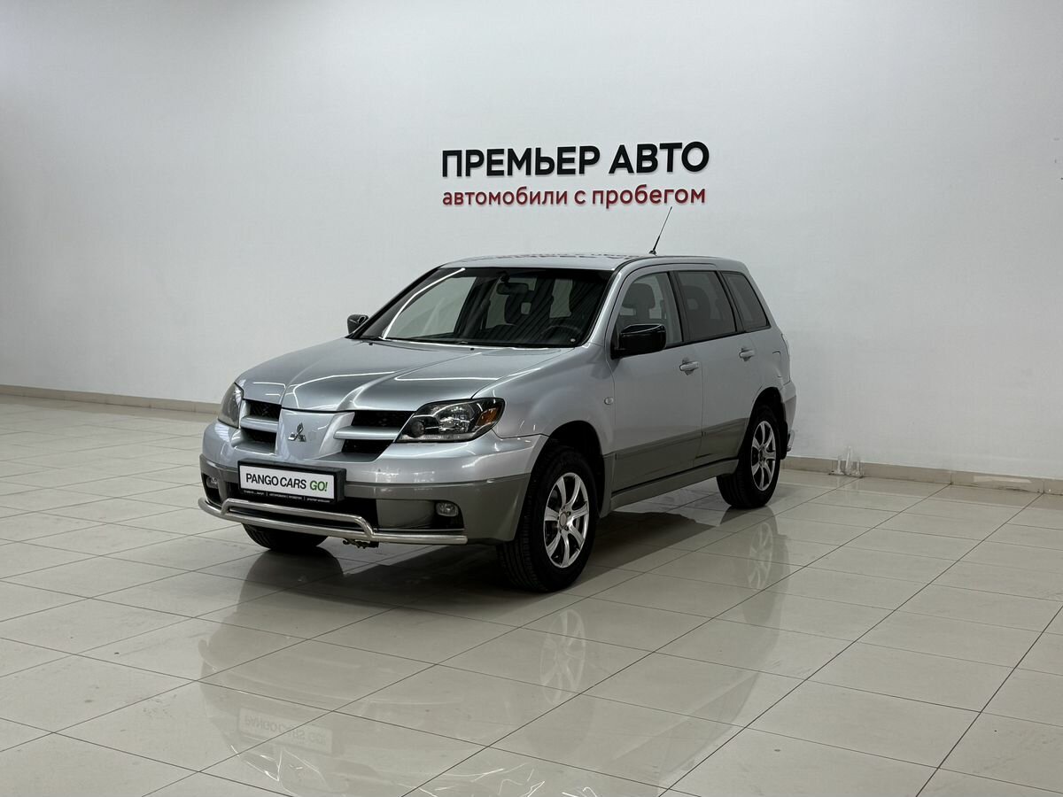 Открыть фотографии: Mitsubishi Outlander I