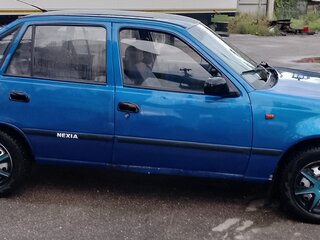 2011 Daewoo Nexia I Рестайлинг, синий, 200000 рублей, вид 4