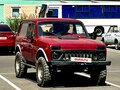 1997 Lada (ВАЗ) 2121 (4x4) I Рестайлинг, красный, 380000 рублей - вид 1