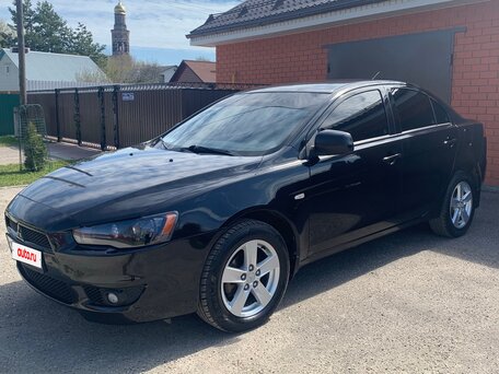 2008 Mitsubishi Lancer X, чёрный, 735000 рублей, вид 1