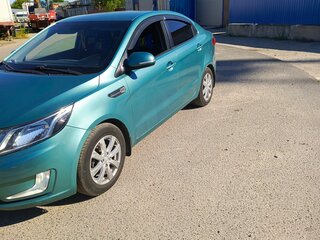 2012 Kia Rio 5-speed III, зелёный, 950000 рублей, вид 5