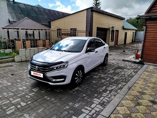 2024 Lada (ВАЗ) Vesta I Рестайлинг (NG), белый, 1310000 рублей, вид 1